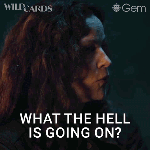 A Woman Says What The Hell Is Going On In A Dark Room GIF