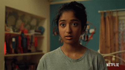 A Woman Says Woah In Front Of A Netflix Ad GIF