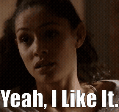 A Woman Says Yeah I Like It In Front Of A Dark Background GIF