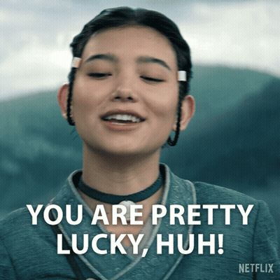 A Woman Says You Are Pretty Lucky Huh In A Netflix Advertisement GIF