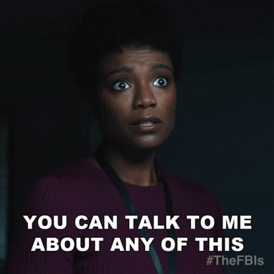 A Woman Says You Can Talk To Me About Any Of This In A Dark Room GIF