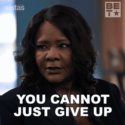 A Woman Says " You Cannot Just Give Up " In Front Of A Bet Logo GIF
