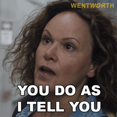 A Woman Says " You Do As I Tell You " In White Letters GIF