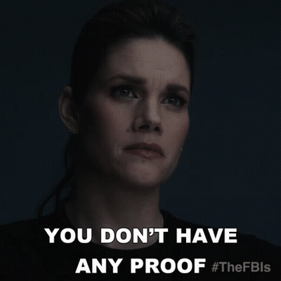 A Woman Says " You Don 'T Have Any Proof " In Front Of A Dark Background GIF