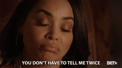 A Woman Says " You Don 'T Have To Tell Me Twice " In Front Of A Bet Logo GIF