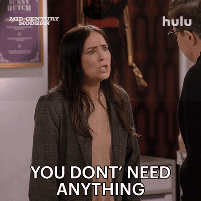 A Woman Says " You Don 'T Need Anything " In Front Of A Man GIF