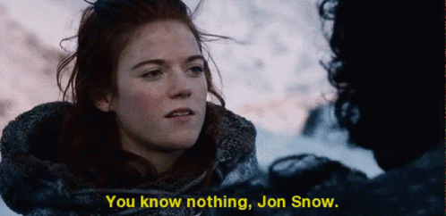 A Woman Says " You Know Nothing Jon Snow " Next To A Man GIF