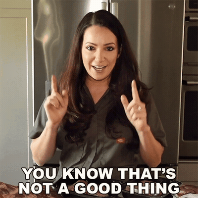 a woman says " you know that 's not a good thing " in front of a refrigerator