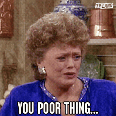 A Woman Says " You Poor Thing " In Front Of Copper Pots GIF