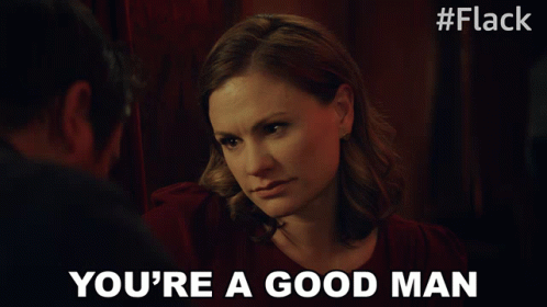 A Woman Says " You 'Re A Good Man " To A Man In A Dark Room GIF
