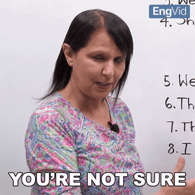 A Woman Says " You 'Re Not Sure " While Pointing At A White Board GIF