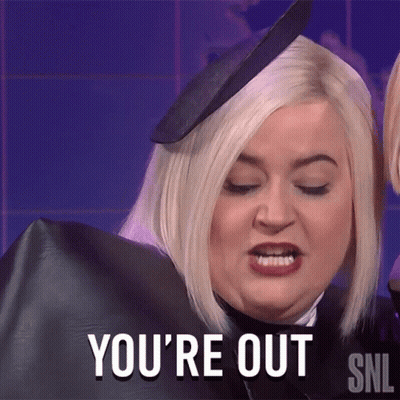 A Woman Says You 'Re Out While Wearing A Black Cape GIF