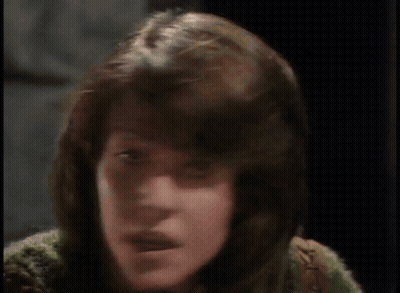 A Woman Says " You 'Re Serious Aren 'T You " In Yellow Letters GIF