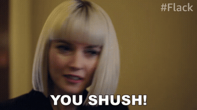 A Woman Says " You Shush " In A Blurry Photo GIF