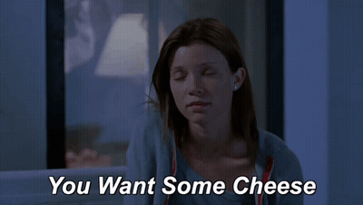 A Woman Says " You Want Some Cheese " In A Movie Scene GIF
