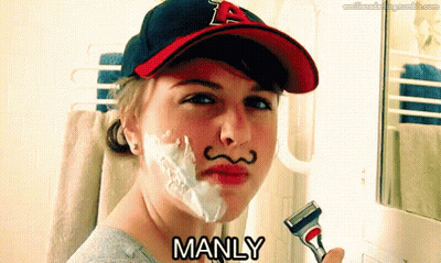 A Woman Shaves Her Face And Says Manly GIF