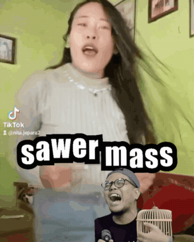 A Woman Singing A Song With The Words Sawer Mass GIF