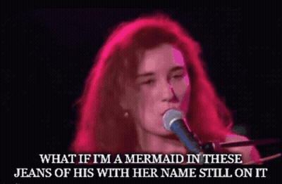 A Woman Singing Into A Microphone With A Caption That Says What If I 'M A Mermaid In These Jeans Of His GIF