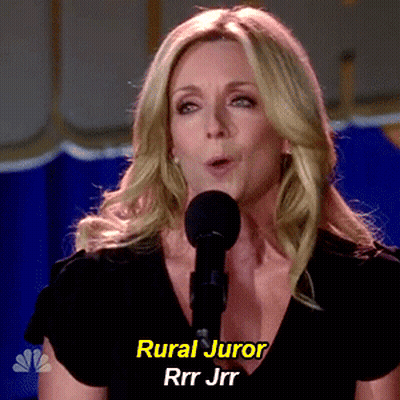 A Woman Singing Into A Microphone With Rural Juror Written On The Bottom Right GIF