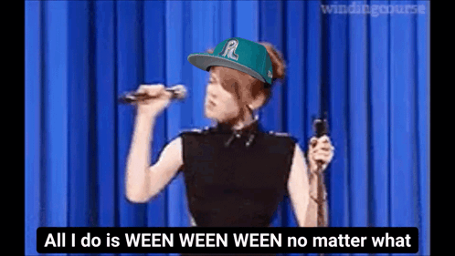 A Woman Singing Into A Microphone With The Words All I Do Is Ween Ween Ween No Matter What Underneath Her GIF