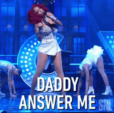 A Woman Singing Into A Microphone With The Words " Daddy Answer Me " Below Her GIF