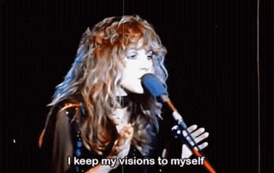 A Woman Singing Into A Microphone With The Words " I Keep My Visions To Myself " Below Her GIF