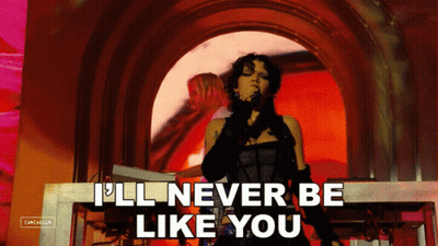 A Woman Singing Into A Microphone With The Words " I 'Ll Never Be Like You " Below Her GIF