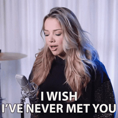 A Woman Singing Into A Microphone With The Words " I Wish I 'Ve Never Met You " Above Her GIF