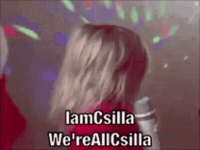 A Woman Singing Into A Microphone With The Words " Iamcsilla We 'Reallcsilla " On The Bottom GIF