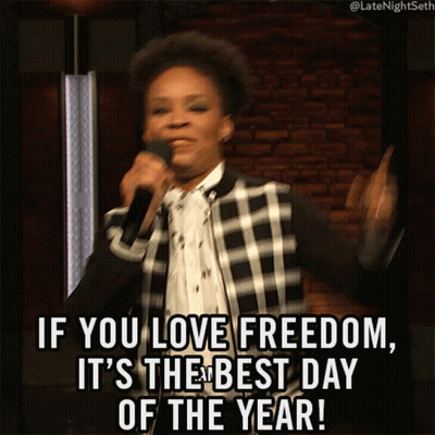 A Woman Singing Into A Microphone With The Words If You Love Freedom It 'S The Best Day Of The Year GIF