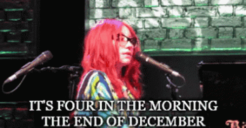 A Woman Singing Into A Microphone With The Words " It 'S Four In The Morning The End Of December " GIF