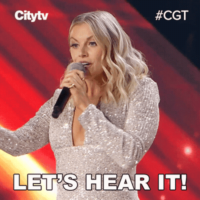 A Woman Singing Into A Microphone With The Words Let 'S Hear It Written Below Her GIF