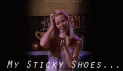 A Woman Singing Into A Microphone With The Words My Sticky Shoes GIF
