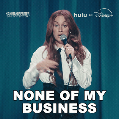 A Woman Singing Into A Microphone With The Words None Of My Business Behind Her GIF