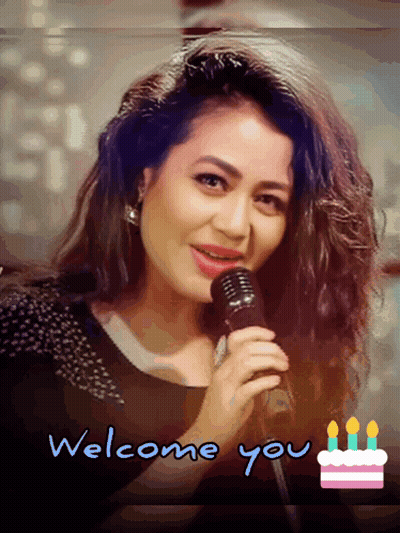 A Woman Singing Into A Microphone With The Words Welcome You Below GIF