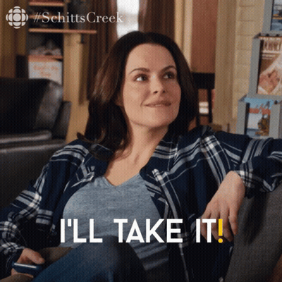 A Woman Sits In A Chair With The Words " I 'Ll Take It " On The Bottom GIF