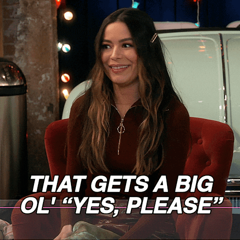 A Woman Sits In A Red Chair With The Words That Gets A Big Ol " Yes Please " GIF