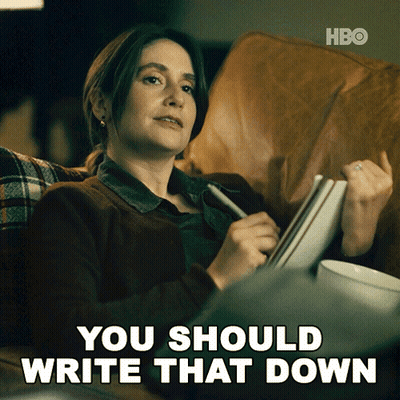 A Woman Sits On A Couch With A Pen In Her Hand And The Words " You Should Write That Down " Next To Her GIF