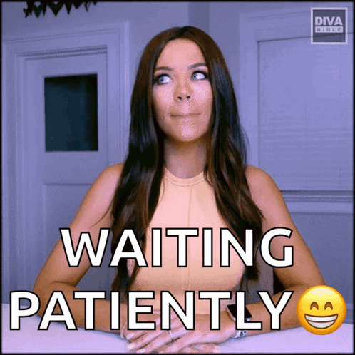 A Woman Sitting At A Table With The Words Waiting Patiently Written On It GIF