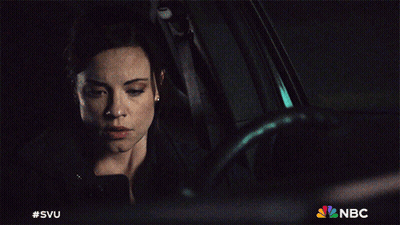 A Woman Sitting In A Car With The Nbc Logo On The Bottom Right GIF