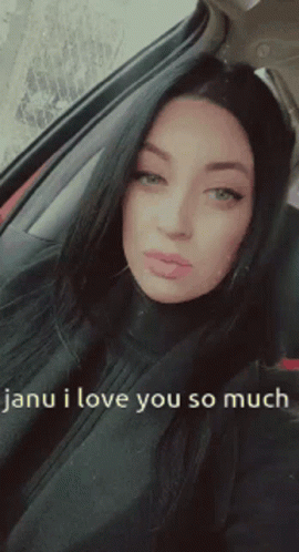 A Woman Sitting In A Car With The Words Janu I Love You So Much GIF
