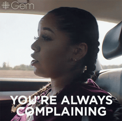 A Woman Sitting In A Car With The Words " You 'Re Always Complaining " Above Her GIF