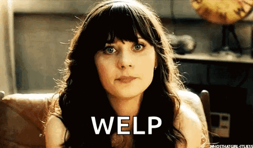 A Woman Sitting In A Chair With The Word Welp On Her Face . GIF