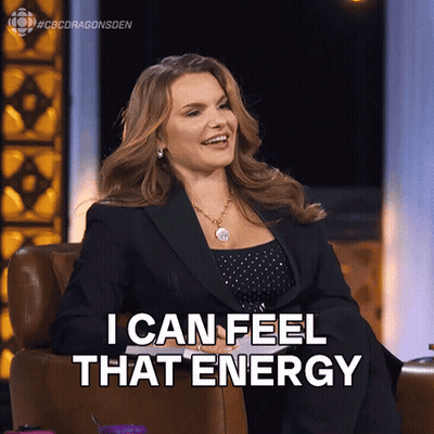 A Woman Sitting In A Chair With The Words I Can Feel That Energy Above Her GIF