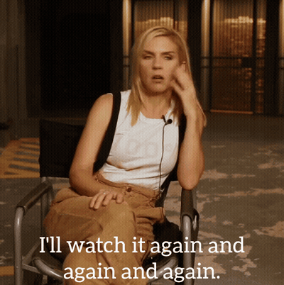 A Woman Sitting In A Chair With The Words " I 'Ll Watch It Again And Again " Written Below Her GIF