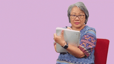 A Woman Sitting In A Chair With The Words I 'M Listening Above Her GIF