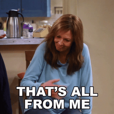 A Woman Sitting In A Chair With The Words That 'S All From Me Below Her GIF