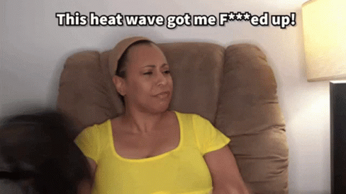 A Woman Sitting In A Chair With The Words This Heat Wave Got Me Fed Up GIF