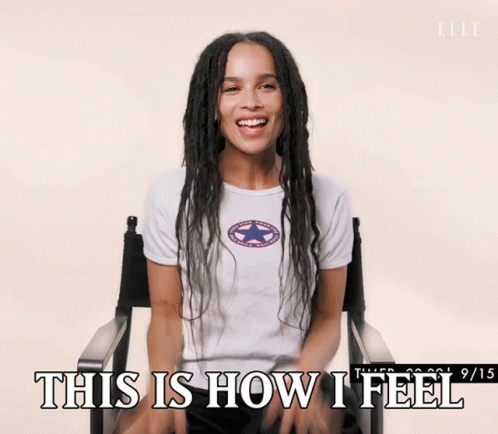 A Woman Sitting In A Chair With The Words " This Is How I Feel " Below Her GIF