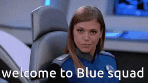 A Woman Sitting In A Chair With The Words Welcome To Blue Squad GIF
